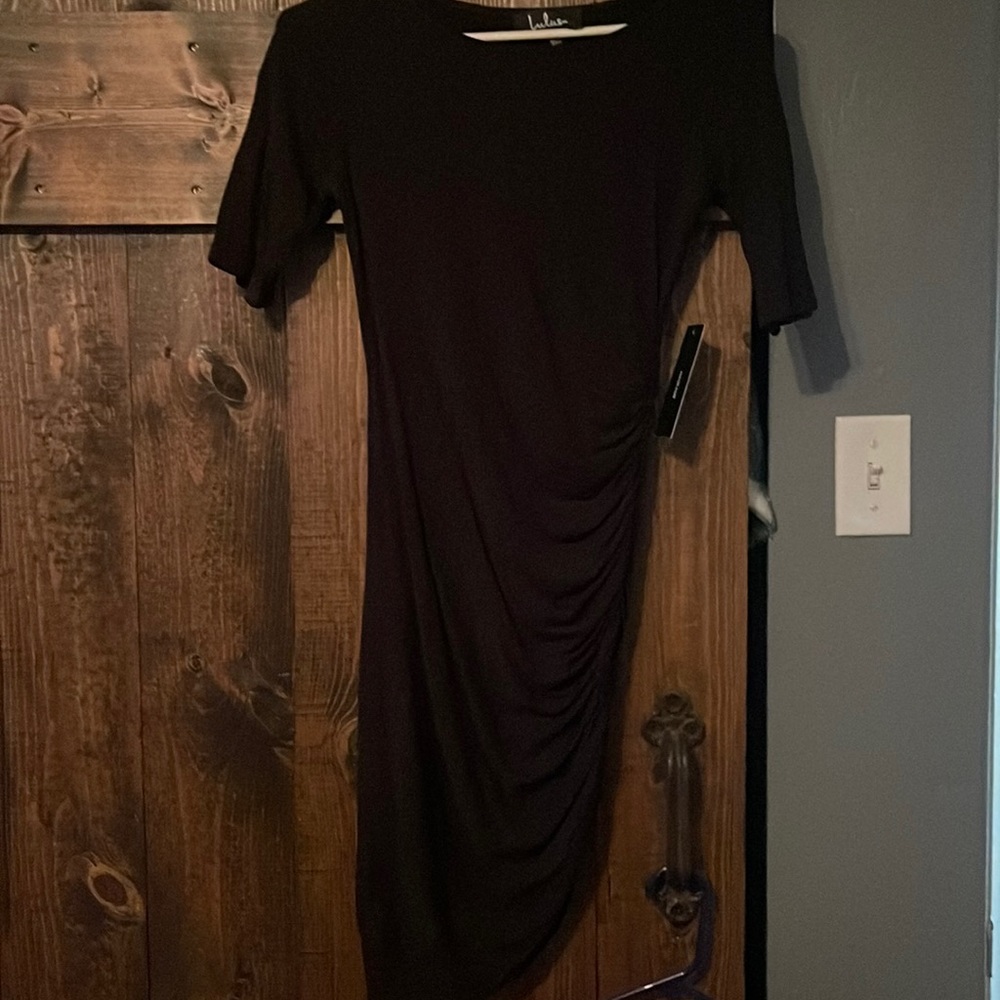 Lulus dress, extra small, ruching on the side. Color is black